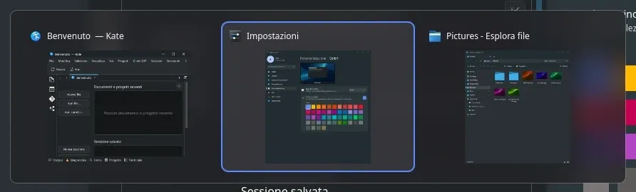 The Alt+Tab switcher with live previews of three windows, the middle one selected.